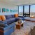 15 Stunning Living Room Designs with Brown, Blue and Orange Accents