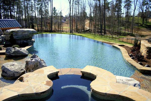 Infinity pool backyard designs