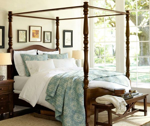 wooden canopy bed