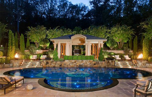 15 Lovely Oval Pool Designs | Home Design Lover