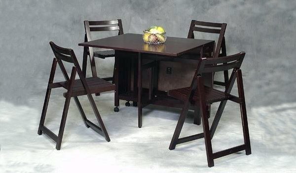 black fold away table and chairs