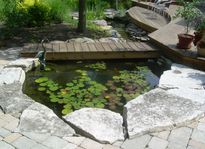 patio ponds koi artisan outdoor pond natural garden bridge looking deck eclectic wood backyard rock waterfall kaufman landscape water creek