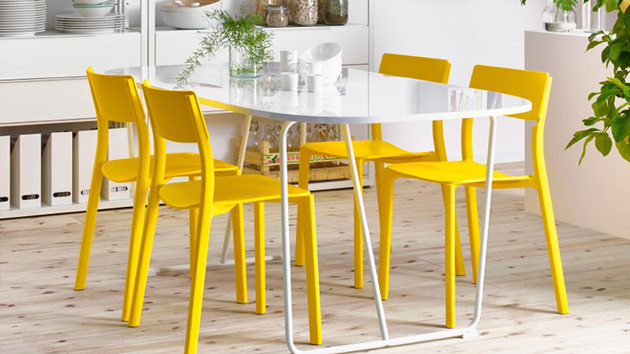 dining room with yellow chairs