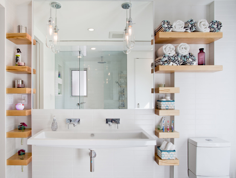 white wooden bathroom shelves