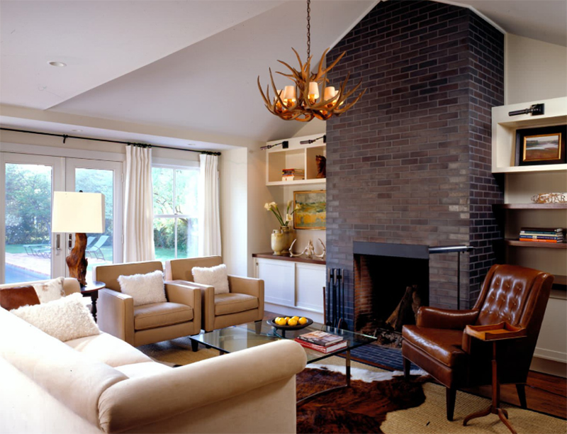 modern living room with brick fireplace