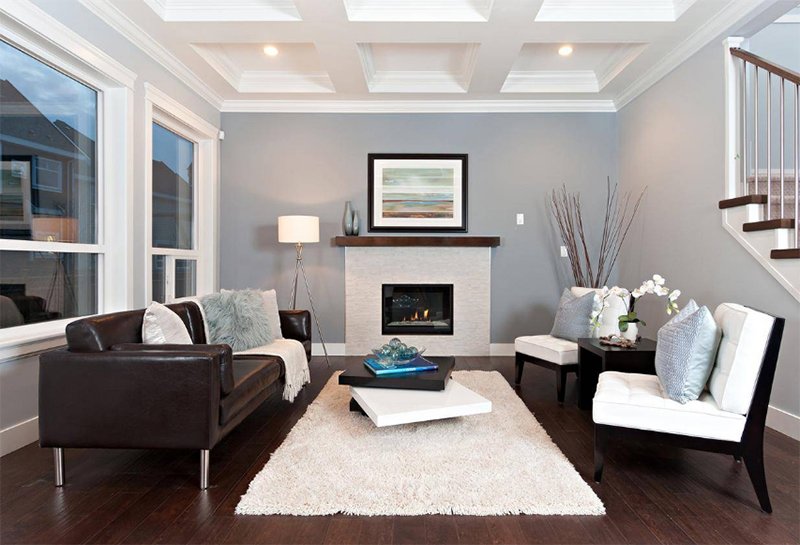 grey living room with brown furniture