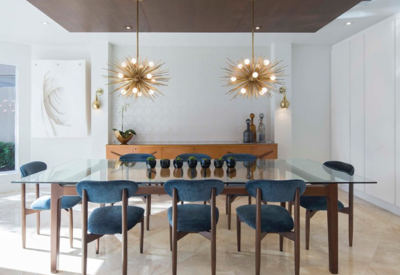 low hanging lights over dining table