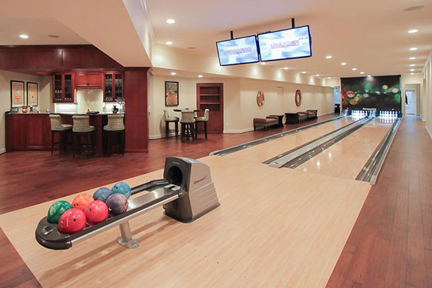 https://homedesignlover.com/wp-content/uploads/2020/04/30-home-bowling-alley-basement.jpg